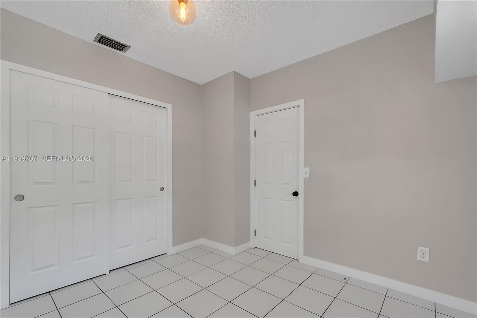 2327 Southwest 22nd Terrace, Unit FRONT Miami, FL 33145 - Photo 18 of 29 a view of an empty room