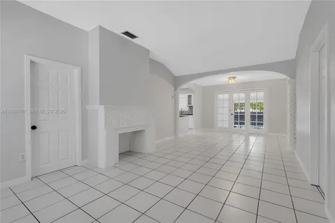 a view of an empty room and window