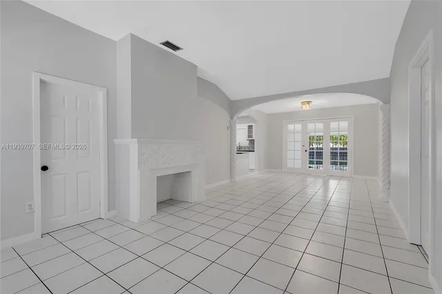 a view of an empty room and window