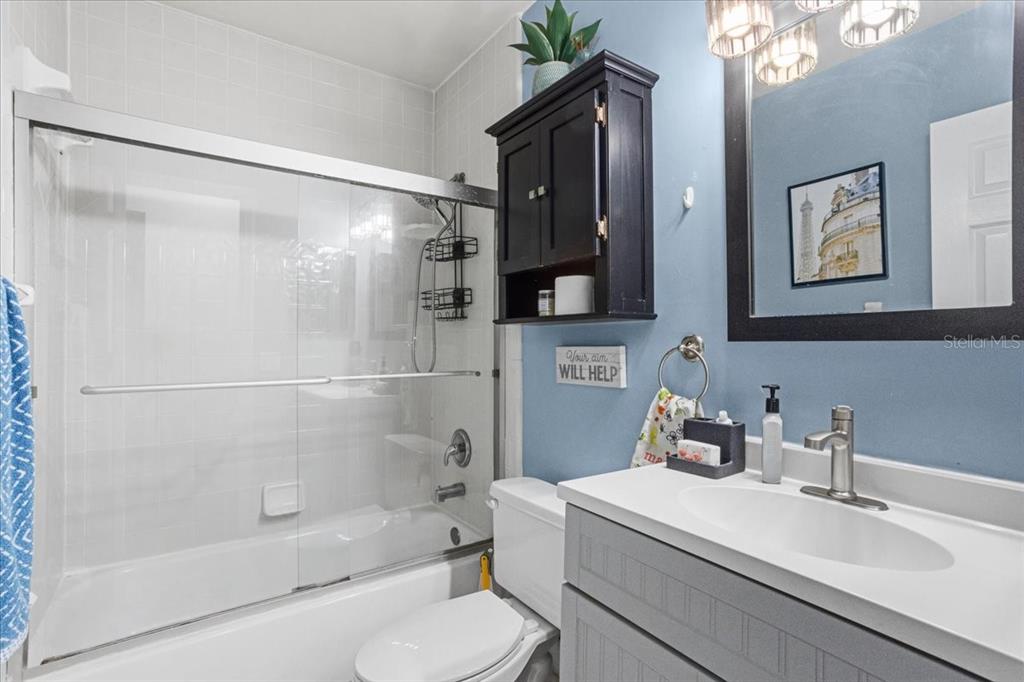 7203 Northwest 121st Avenue Alachua, FL 32615 - Photo 20 of 37 a bathroom with a sink toilet and shower