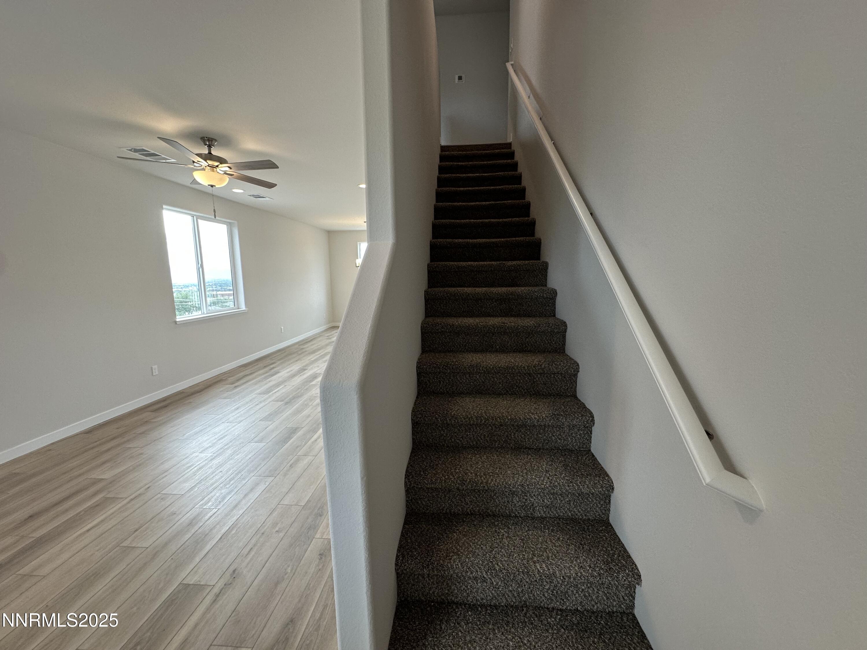 1180 Arrastra Road Reno, NV 89512 - Photo 17 of 48 a view of entryway and hall with wooden floor