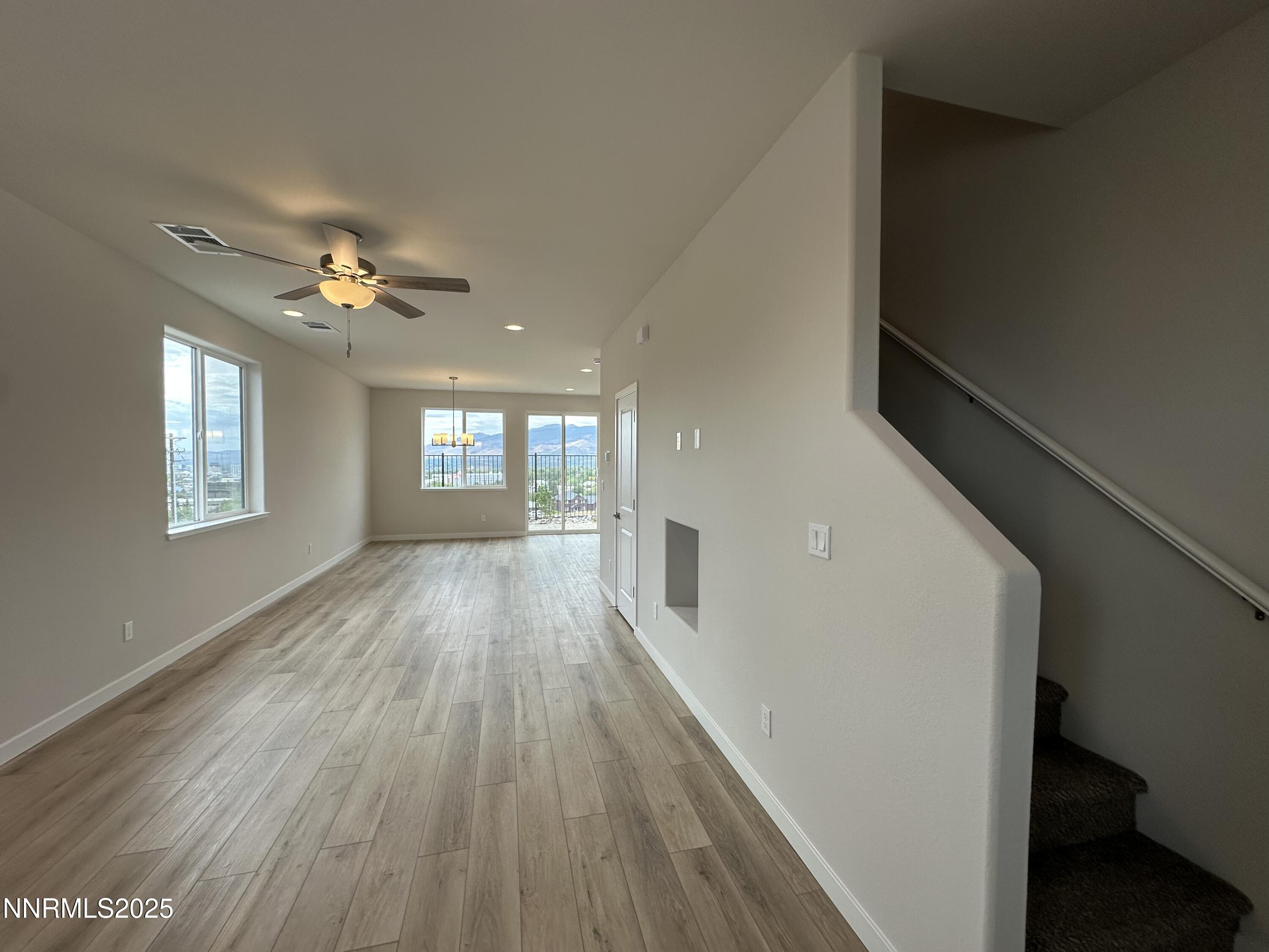 1180 Arrastra Road Reno, NV 89512 - Photo 5 of 48 a view of entryway and hall with wooden floor