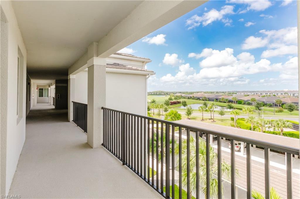 6034 National Boulevard, Unit 542 Ave Maria, FL 34142 - Photo 14 of 36 a view of a city from a balcony