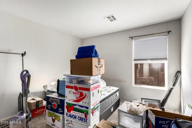 a room with furniture and a window