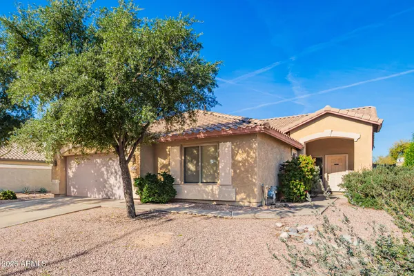 front view of a house with a street