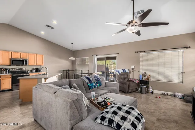 a living room with furniture and a window