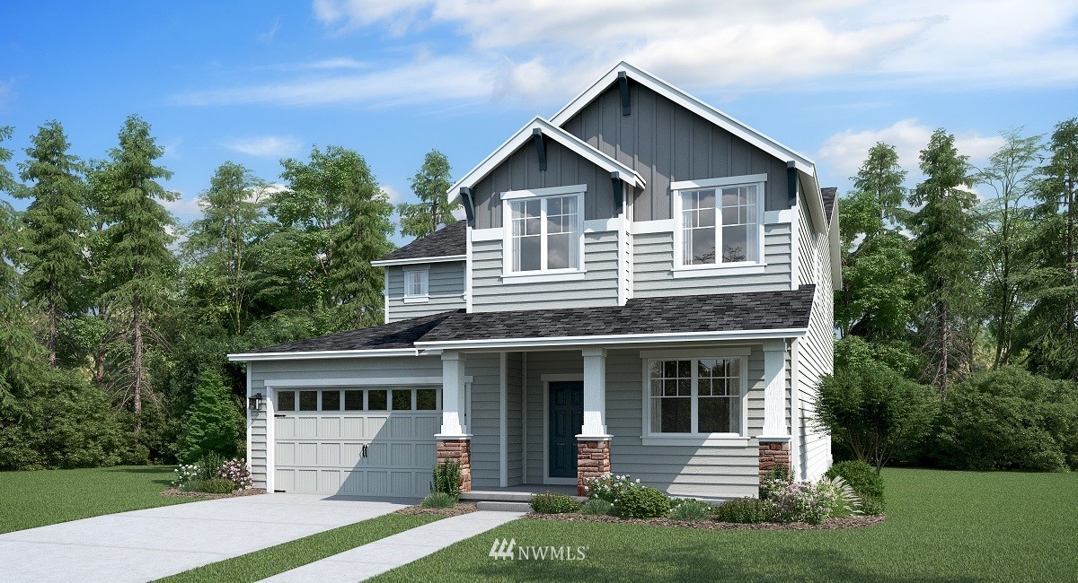 23502 41st Drive Southeast, Unit 57 Bothell, WA 98021 - Photo 1 of 4 a front view of a house with a yard