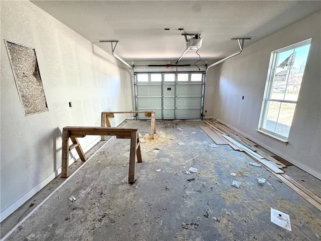 a view of a livingroom with furniture and window