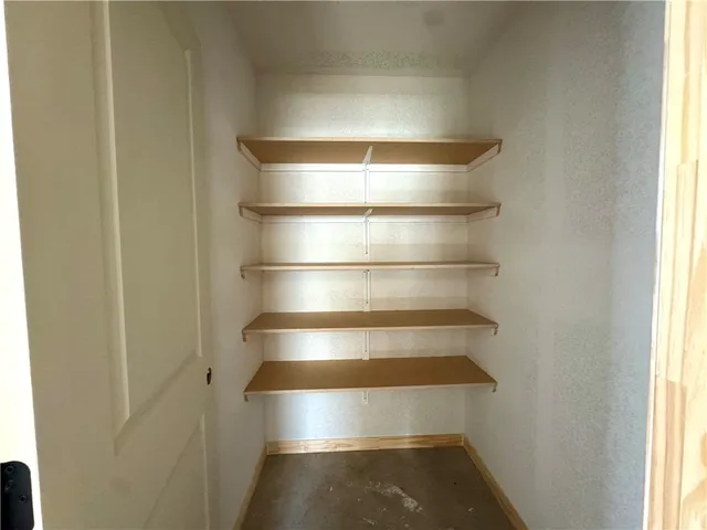 a view of room with empty cabinets