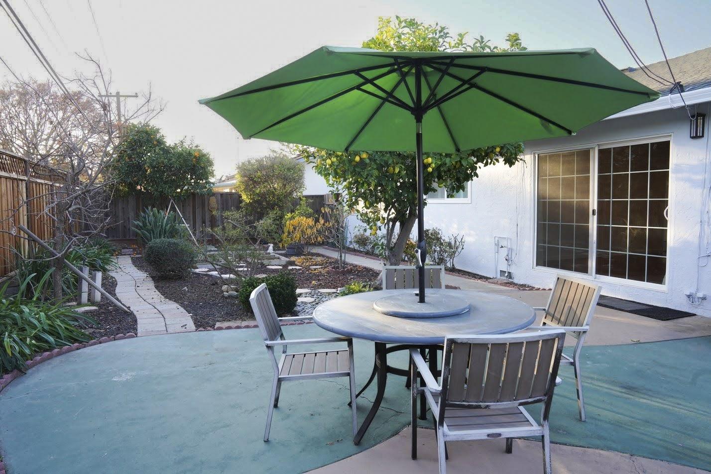 1642 Matson Drive San Jose, CA 95124 - Photo 12 of 15 a view of an outdoor sitting area with furniture and umbrella