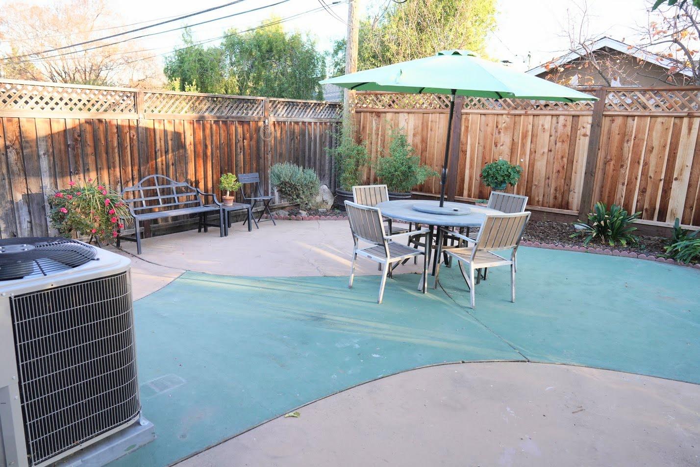 1642 Matson Drive San Jose, CA 95124 - Photo 14 of 15 a view of a backyard with furniture and a garden