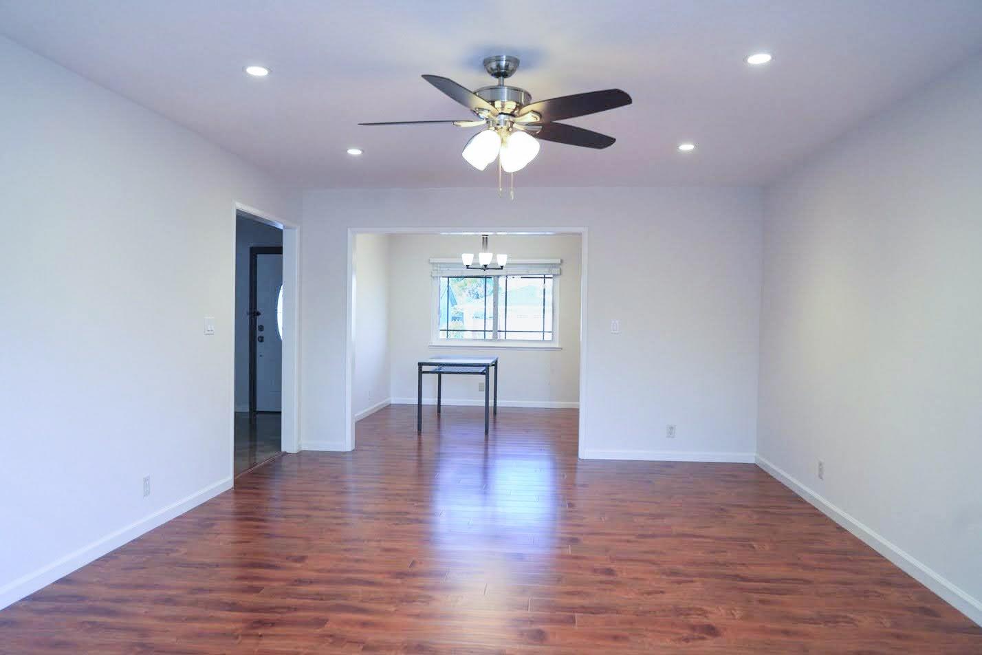 1642 Matson Drive San Jose, CA 95124 - Photo 3 of 15 a view of an empty room with wooden floor and a window