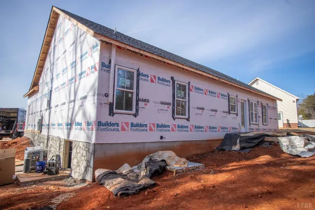 a front view of a building with glass windows