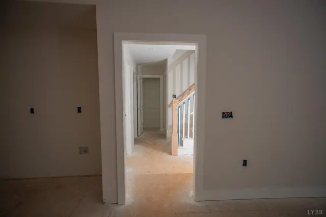 a view of a livingroom from a hallway