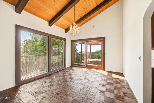 a view of a room with a large window