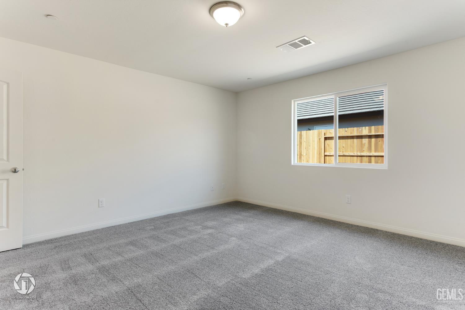 Undisclosed Address Shafter, CA 93263 - Photo 17 of 27 an empty room with a window