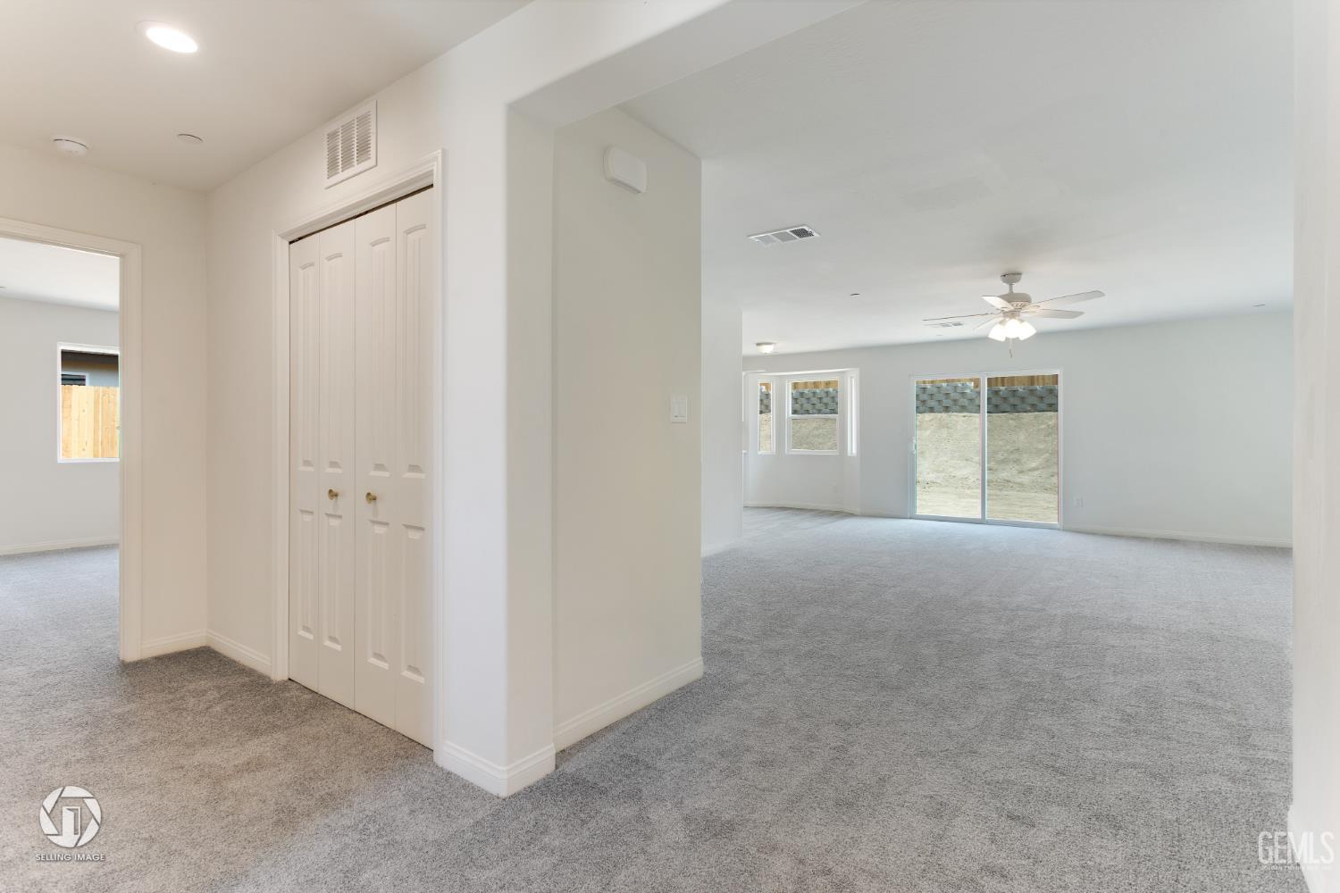 Undisclosed Address Shafter, CA 93263 - Photo 2 of 27 a view of a livingroom with an empty space and a window