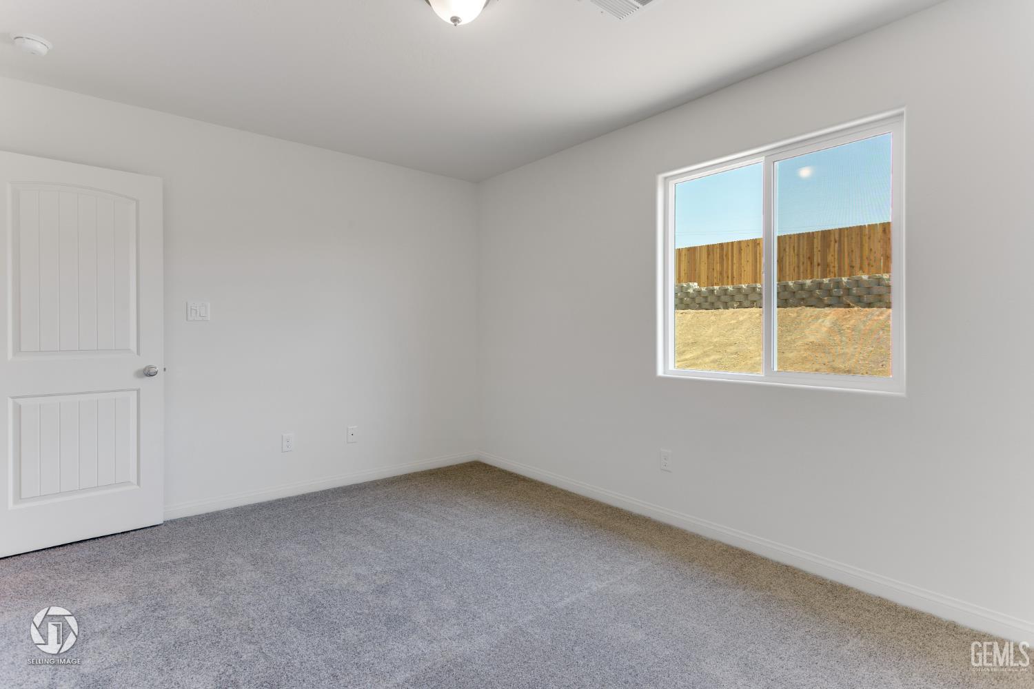 Undisclosed Address Shafter, CA 93263 - Photo 26 of 27 an empty room with a window