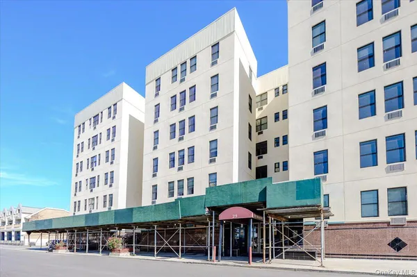 front view of a building with a street