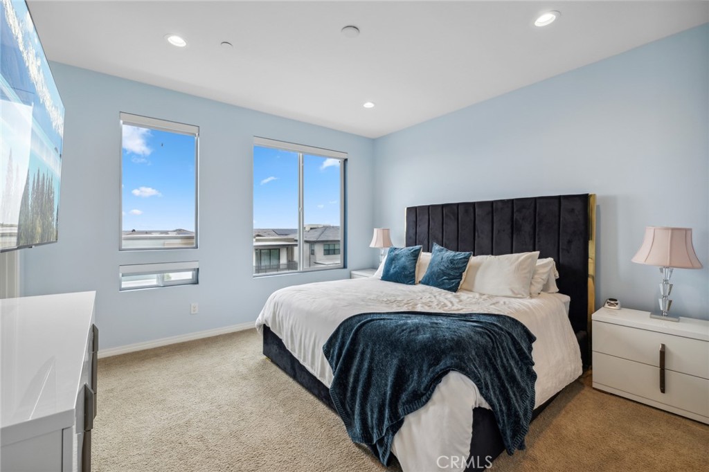 160 Keeper Irvine, CA 92618 - Photo 12 of 29 a bedroom with a bed and a cabinets