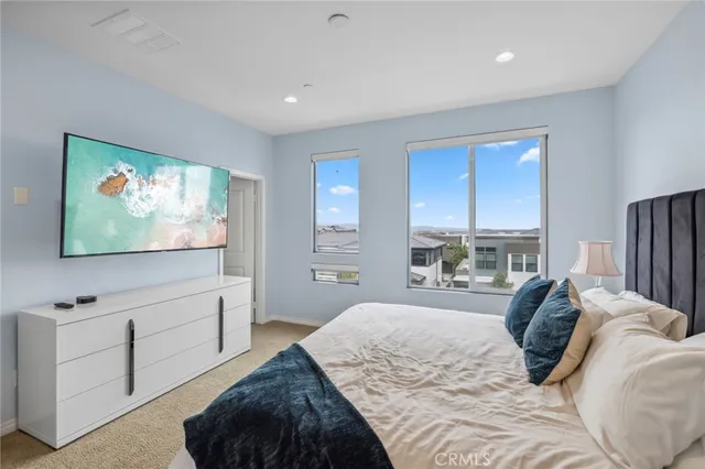 a bathroom with a granite countertop sink mirror and double