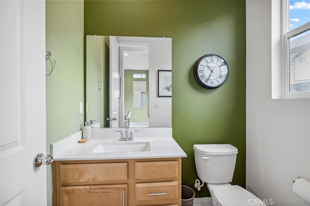 160 Keeper Irvine, CA 92618 - Photo 17 of 29 a bathroom with a toilet sink and mirror