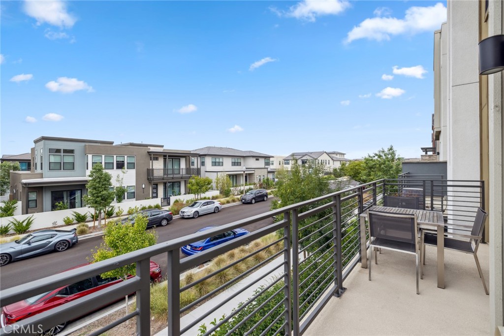 160 Keeper Irvine, CA 92618 - Photo 21 of 29 a city view from a balcony with furniture