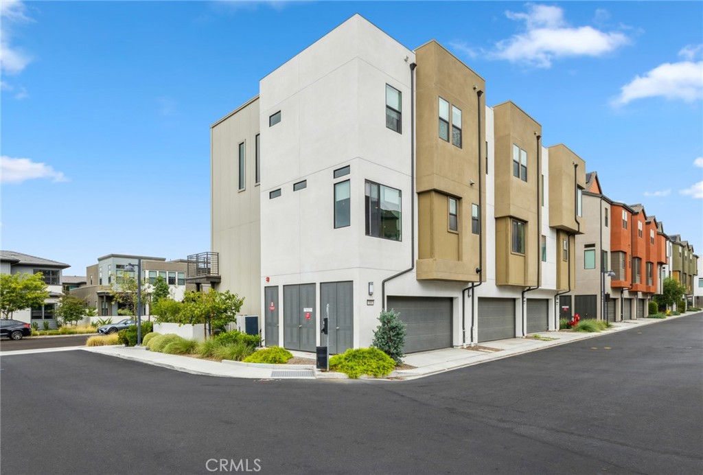 160 Keeper Irvine, CA 92618 - Photo 23 of 29 a view of a tall building next to a road