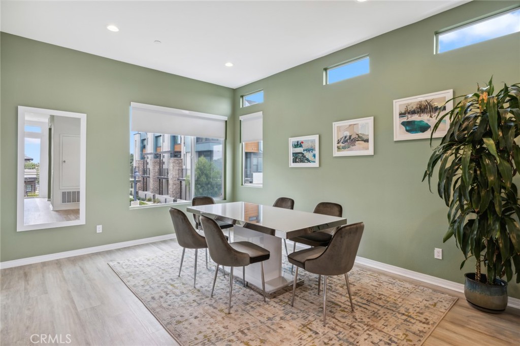 160 Keeper Irvine, CA 92618 - Photo 6 of 29 a dining room with furniture and wooden floor
