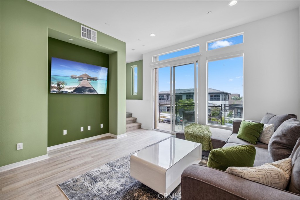 160 Keeper Irvine, CA 92618 - Photo 9 of 29 a living room with furniture and a large window