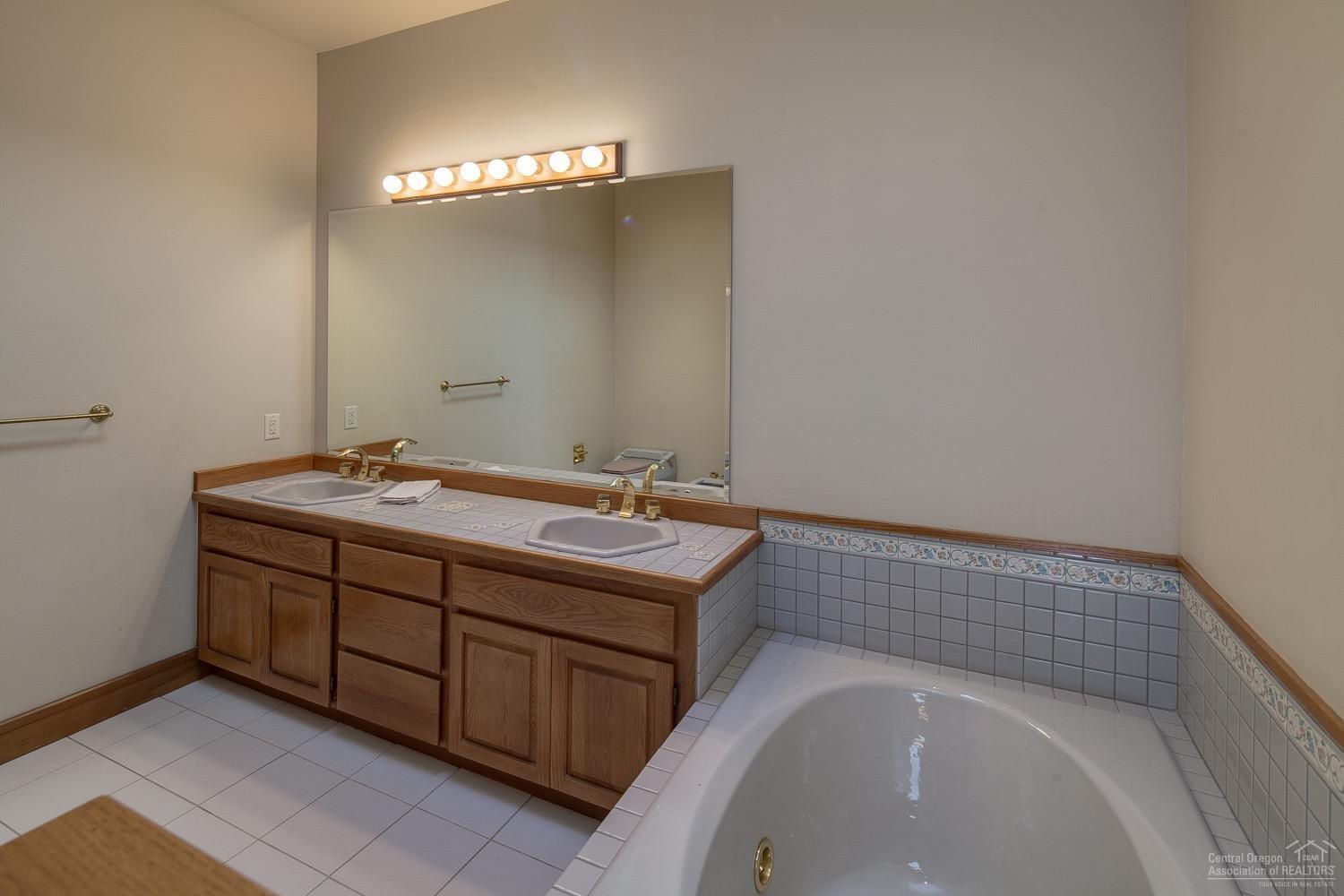 62336 Deer Trail Road Bend, OR 97701 - Photo 14 of 24 The master bath is large and open. Whil