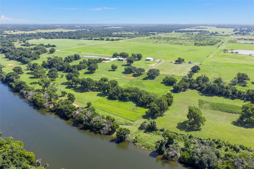 101 Private Road Aquilla, TX 76622 - Photo 4 of 19 Overview of rural landscape with a large body of water