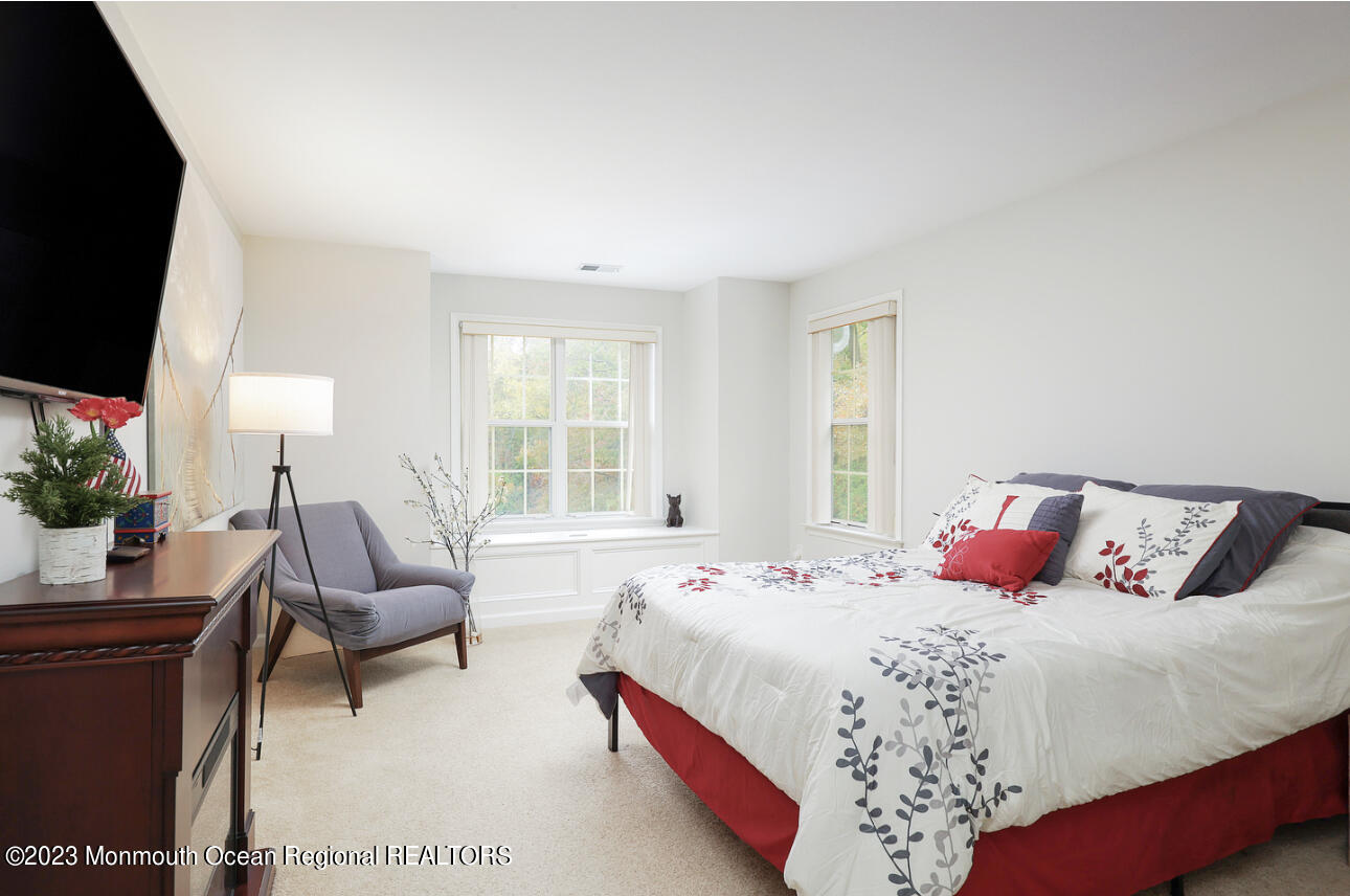 309 Raintree Court, Unit 309 Helmetta, NJ 08828 - Photo 15 of 22 Master Bedroom