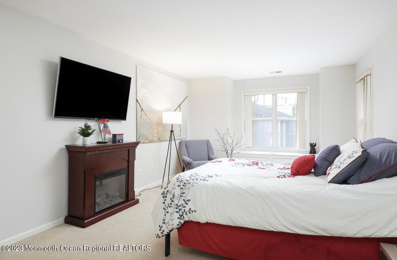309 Raintree Court, Unit 309 Helmetta, NJ 08828 - Photo 16 of 22 Master Bedroom