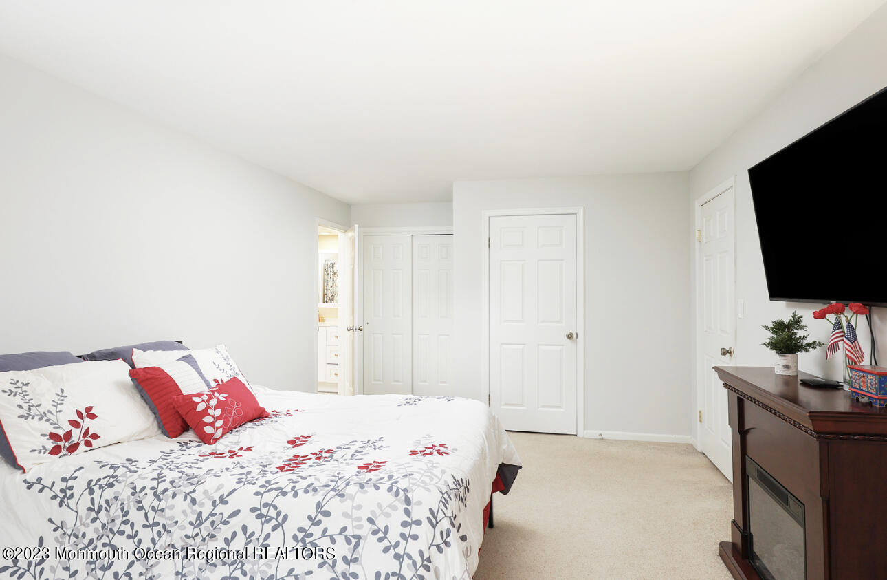 309 Raintree Court, Unit 309 Helmetta, NJ 08828 - Photo 17 of 22 Master Bedroom