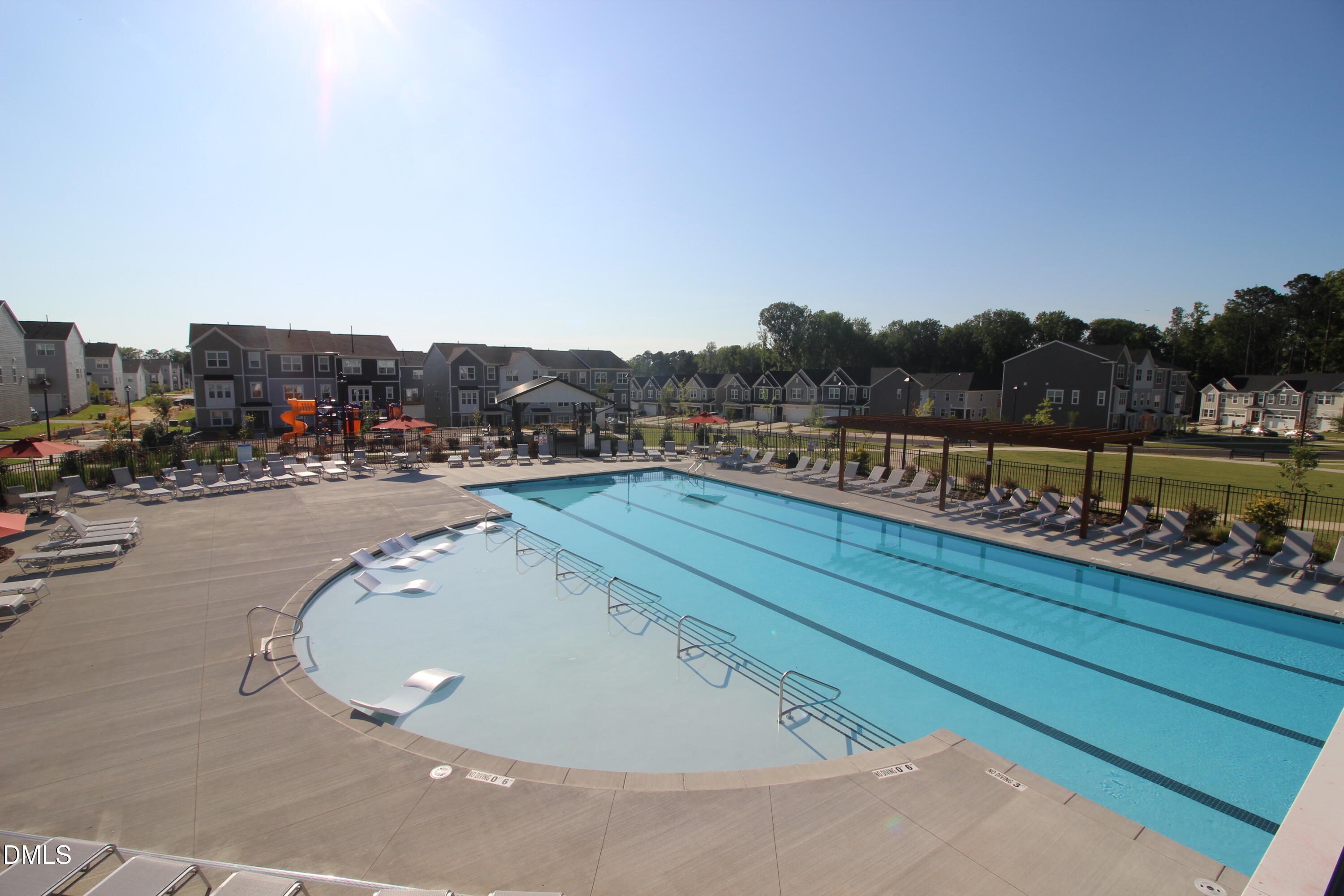 1705 Barrett Run Trail Apex, NC 27502 - Photo 23 of 24 a view of a swimming pool with a terrace