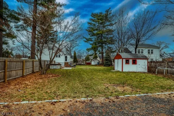 a house with trees in front of it