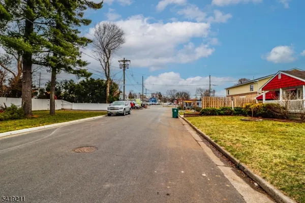 a view of a swimming pool with a lounge chairs