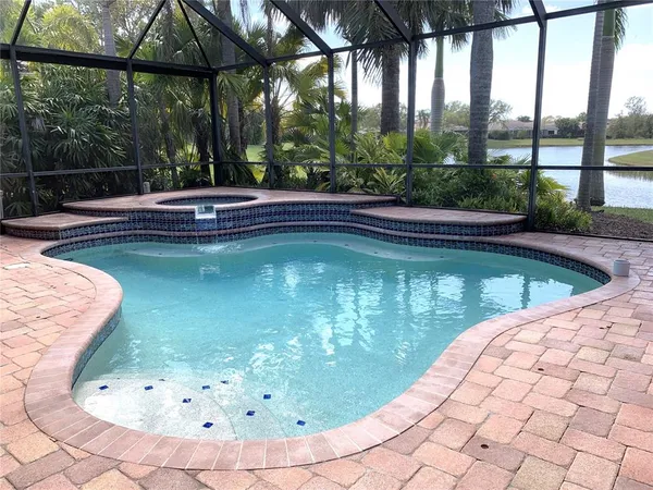 a view of a swimming pool with a porch