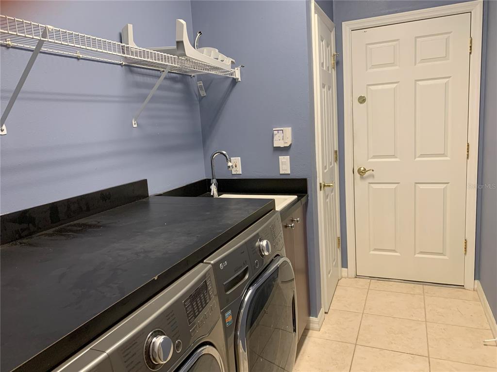 6828 Honeysuckle Trail Lakewood Ranch, FL 34202 - Photo 35 of 36 an outdoor space with wooden floor