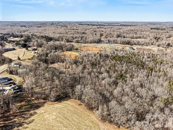a view of swimming pool from a yard