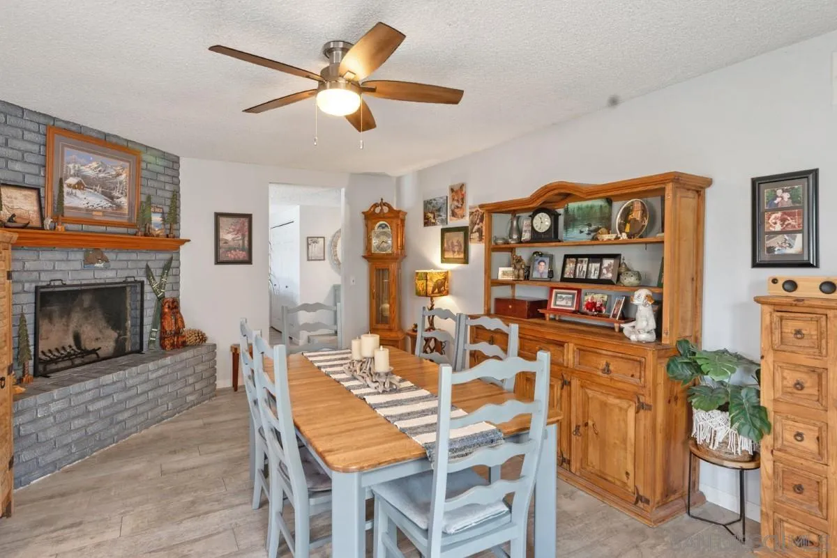 10952 Avenida Roberta Spring Valley, CA 91978 - Photo 13 of 35 a view of a livingroom with furniture and a fireplace