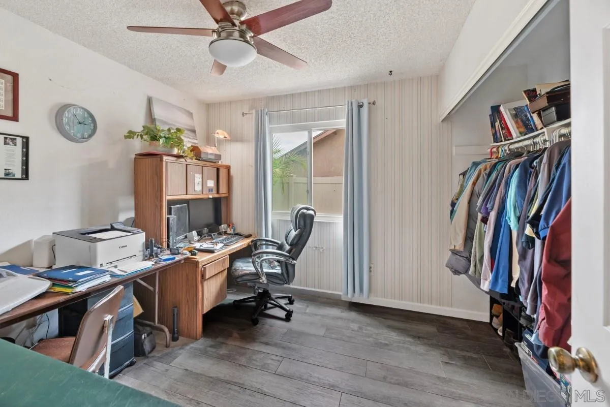 10952 Avenida Roberta Spring Valley, CA 91978 - Photo 21 of 35 a view of a workspace with furniture and a window