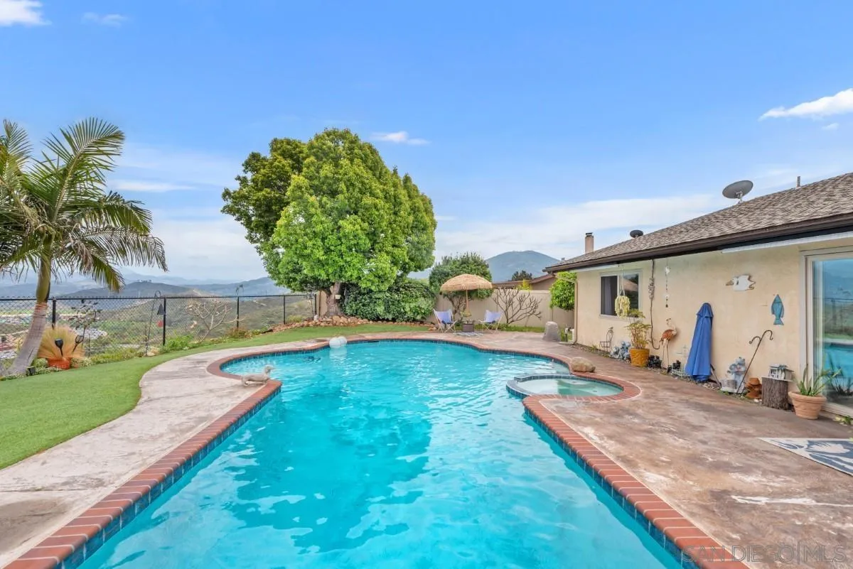 10952 Avenida Roberta Spring Valley, CA 91978 - Photo 25 of 35 a swimming pool with outdoor seating and yard