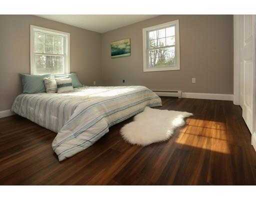 3 Toll Road Salisbury, MA 01952 - Photo 7 of 24 a spacious bedroom with a bed and wooden floor