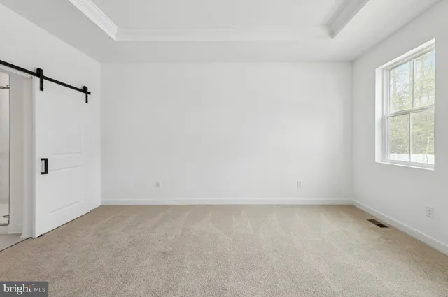 a bathroom with a double vanity sink and mirror