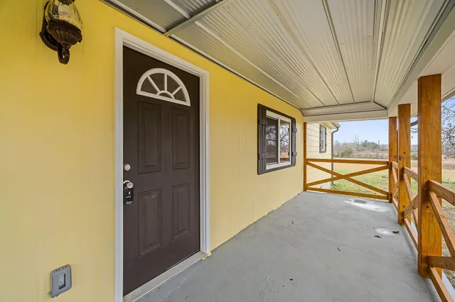 a view of an outdoor space with a large window