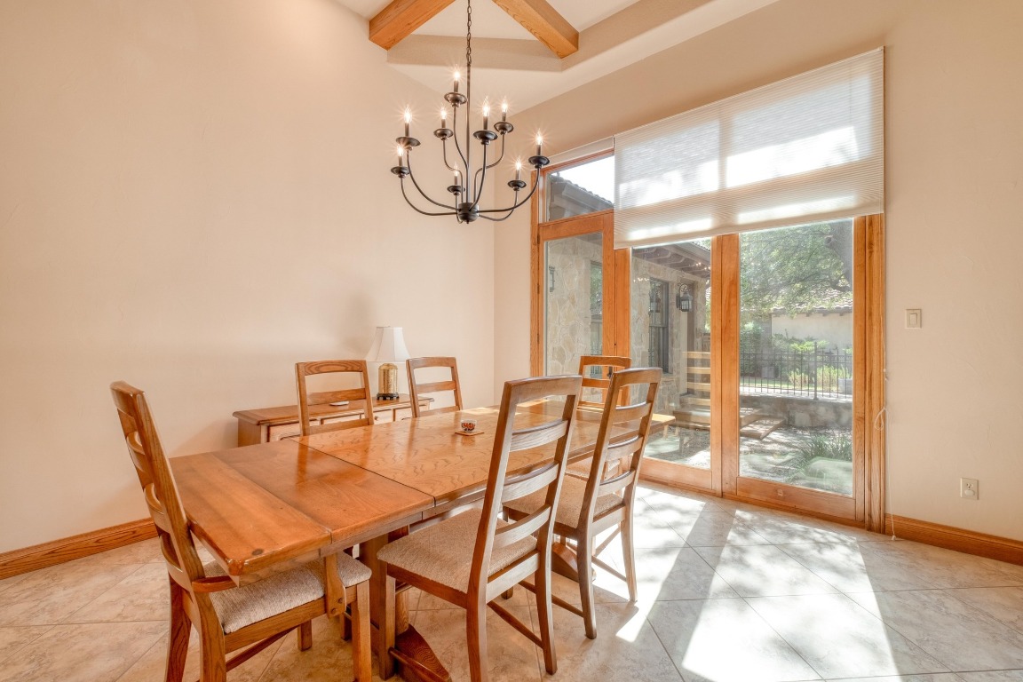 205 Flint Ridge Trail Georgetown, TX 78628 - Photo 12 of 40 a view of a dining room with furniture window and outside view