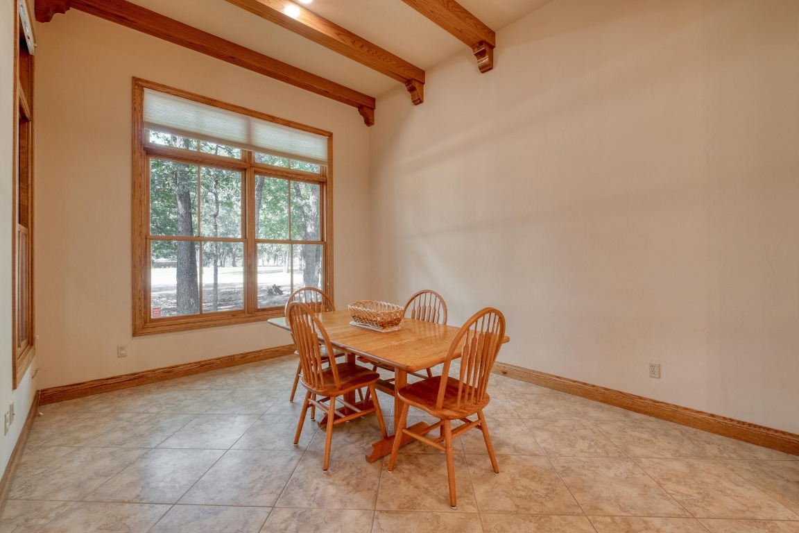 205 Flint Ridge Trail Georgetown, TX 78628 - Photo 17 of 40 a dining room with furniture and window
