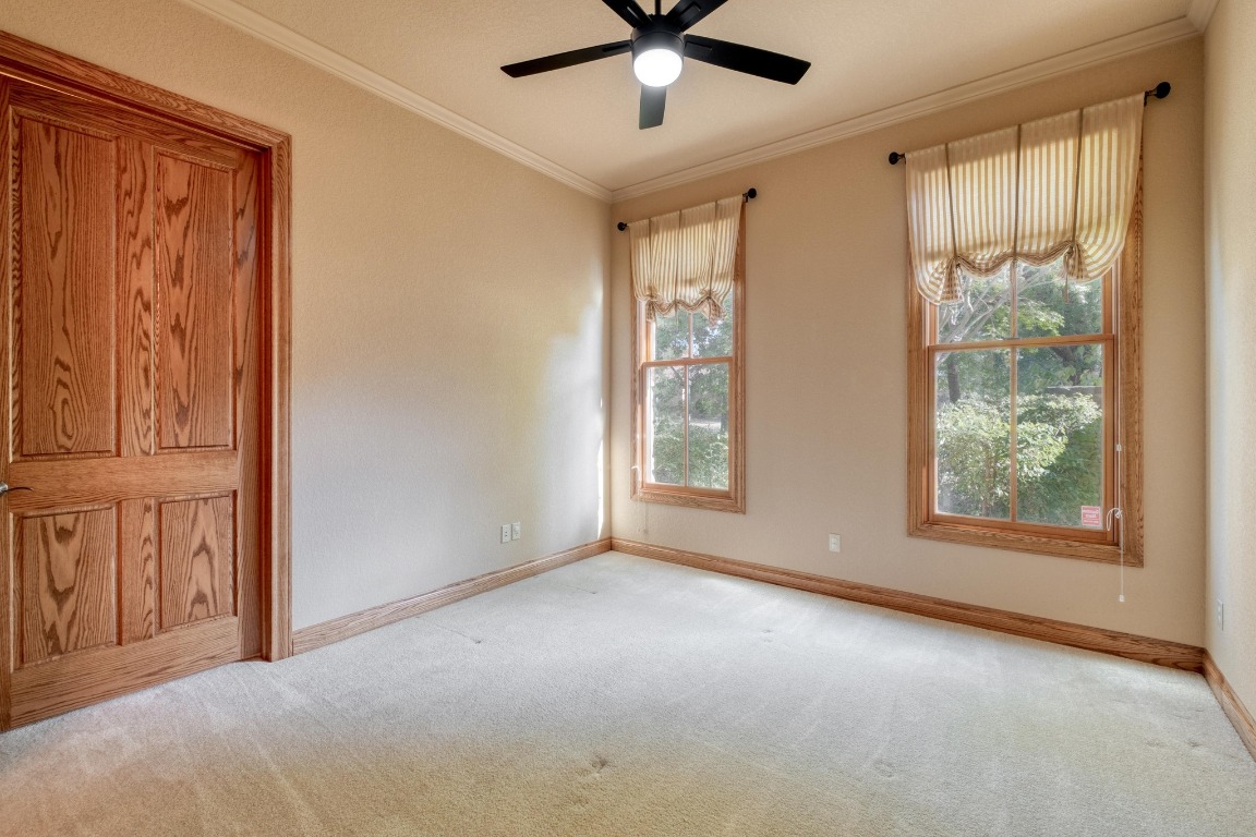 205 Flint Ridge Trail Georgetown, TX 78628 - Photo 25 of 40 an empty room with windows and closet